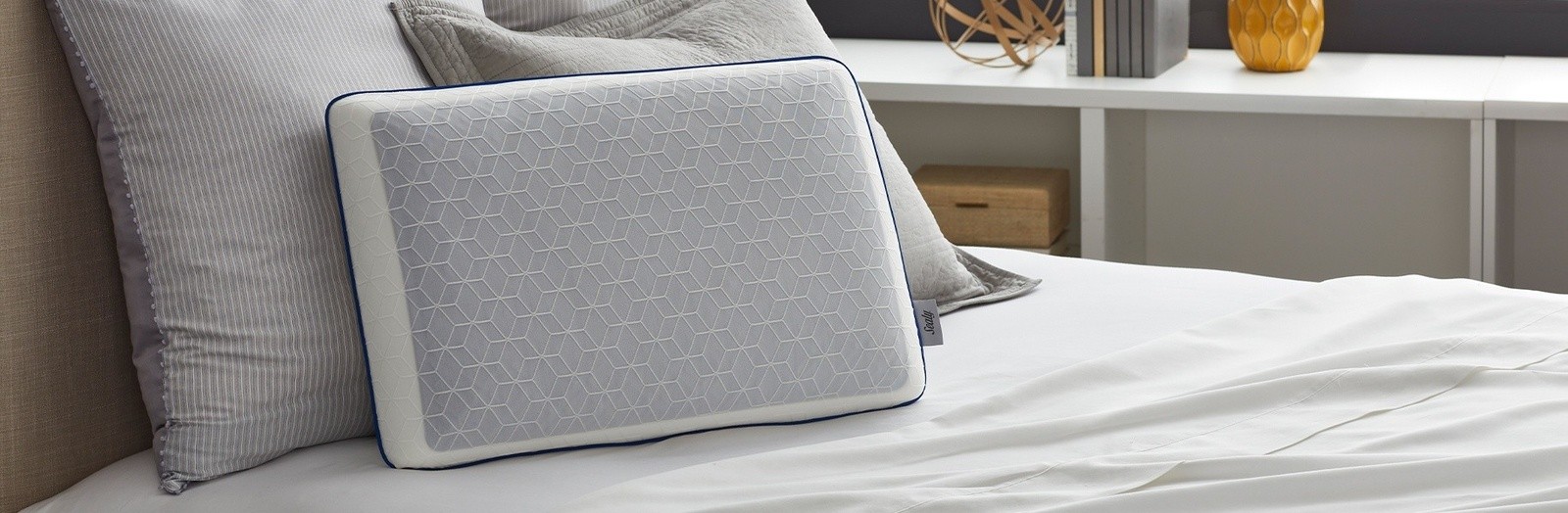 Sealy Gel Pillow on a dressed bed