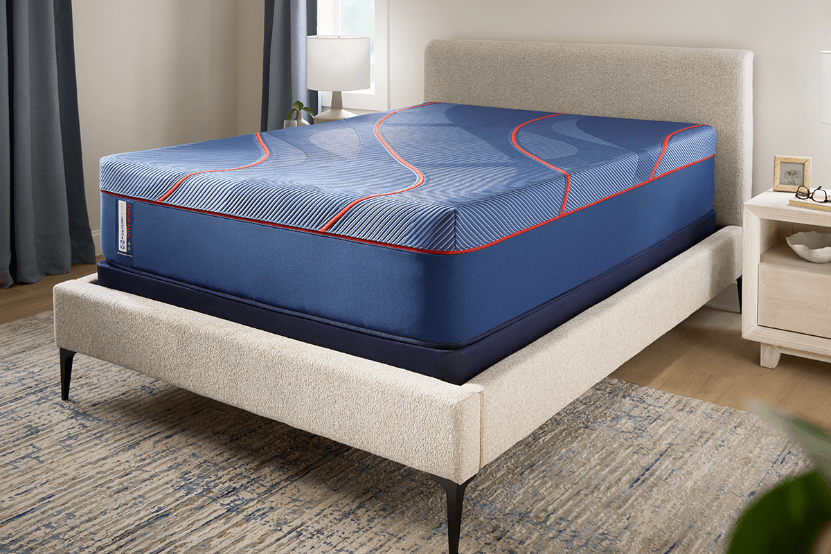 naked Posturepedic elite mattress in a styled room